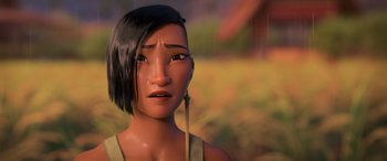 Movie still from “Raya and the Last Dragon” (2021), directed by Don Hall – An animated woman with a long black hair; Close Up shot, Over the shoulder angle
