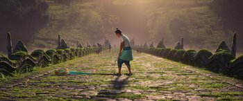 Movie still from “Raya and the Last Dragon” (2021), directed by Don Hall – A woman is walking down the street with a parasol; Extreme Wide shot, High angle