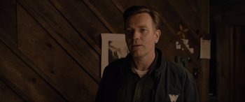 Movie still from “Raymond & Ray” (2022), directed by Rodrigo García – A person wearing a jacket; Close Up shot, Over the shoulder angle