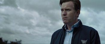 Movie still from “Raymond & Ray” (2022), directed by Rodrigo García – A person wearing a jacket; Close Up shot, Low angle