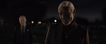 Movie still from “Raymond & Ray” (2022), directed by Rodrigo García – An older man wearing a jacket and a sweater; Close Up shot, Over the shoulder angle