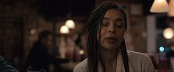 Movie still from “Raymond & Ray” (2022), directed by Rodrigo García – A woman with her eyes closed with her eyes closed; Close Up shot, Low angle