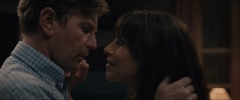 Movie still from “Raymond & Ray” (2022), directed by Rodrigo García – A man and a woman looking at each other; Close Up shot, Over the shoulder angle