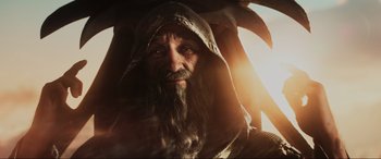 Movie still from “Ready Player One” (2018), directed by Steven Spielberg – An old man with a long beard wearing a hood; Close Up shot, Low angle