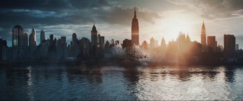 Movie still from “Ready Player One” (2018), directed by Steven Spielberg – A city skyline with a large body of water in front of it; Extreme Wide shot, High angle