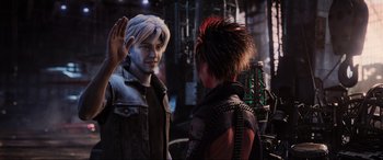 Movie still from “Ready Player One” (2018), directed by Steven Spielberg – A man and a woman standing next to each other; Medium shot, Over the shoulder angle