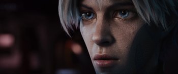 Movie still from “Ready Player One” (2018), directed by Steven Spielberg – A woman's face with blue eyes; Extreme Close Up shot, High angle