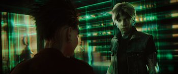 Movie still from “Ready Player One” (2018), directed by Steven Spielberg – A man and a woman looking at each other in a mirror; Close Up shot, Over the shoulder angle
