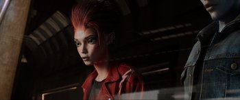 Movie still from “Ready Player One” (2018), directed by Steven Spielberg – A woman with red hair and green eyes looking at the camera; Close Up shot, High angle