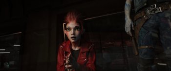 Movie still from “Ready Player One” (2018), directed by Steven Spielberg – A person with red hair and green eyes is wearing a red jacket; Close Up shot, High angle