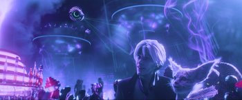 Movie still from “Ready Player One” (2018), directed by Steven Spielberg – A man in a suit is in a room with lights; Close Up shot, Low angle