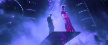 Movie still from “Ready Player One” (2018), directed by Steven Spielberg – A man and a woman standing next to each other; Wide shot, Low angle