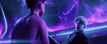 Movie still from “Ready Player One” (2018), directed by Steven Spielberg – A woman sitting in a car next to another woman; Medium shot, Over the shoulder angle