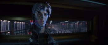 Movie still from “Ready Player One” (2018), directed by Steven Spielberg – A young man with blue and white makeup on his face; Close Up shot, Over the shoulder angle