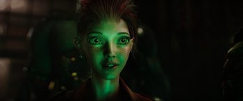 Movie still from “Ready Player One” (2018), directed by Steven Spielberg – A person with green eyes; Close Up shot, Over the shoulder angle