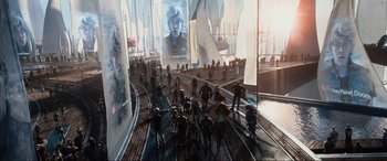 Movie still from “Ready Player One” (2018), directed by Steven Spielberg – A group of people standing on top of a wooden walkway; Extreme Wide shot, High angle