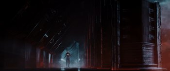 Movie still from “Ready Player One” (2018), directed by Steven Spielberg – A man is standing in the dark in a room; Extreme Wide shot, Low angle