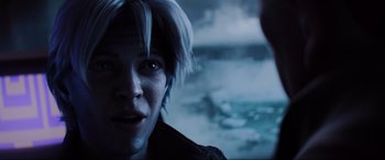 Movie still from “Ready Player One” (2018), directed by Steven Spielberg – A person's face in the dark; Close Up shot, Over the shoulder angle