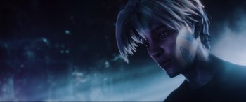 Movie still from “Ready Player One” (2018), directed by Steven Spielberg – A person's face with a dark sky in the background; Close Up shot, Low angle