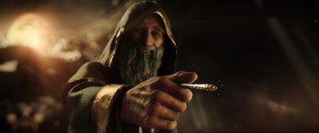 Movie still from “Ready Player One” (2018), directed by Steven Spielberg – An old man holding a cigarette in his hand; Extreme Close Up shot, Low angle