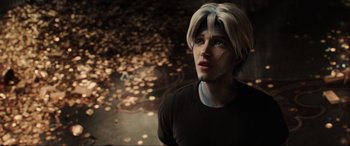 Movie still from “Ready Player One” (2018), directed by Steven Spielberg – A man with blonde hair and blue eyes stares into the distance; Close Up shot, High angle
