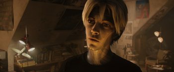 Movie still from “Ready Player One” (2018), directed by Steven Spielberg – A young man with blonde hair is looking at the camera; Close Up shot, Low angle