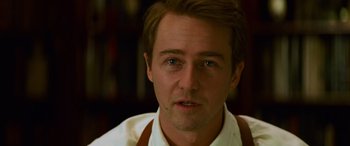 Movie still from “Red Dragon” (2002), directed by Brett Ratner – A person wearing an apron; Close Up shot, Over the shoulder angle