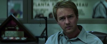 Movie still from “Red Dragon” (2002), directed by Brett Ratner – A person wearing a white shirt; Close Up shot, Over the shoulder angle