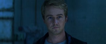 Movie still from “Red Dragon” (2002), directed by Brett Ratner – A person wearing a leather jacket; Close Up shot, Low angle