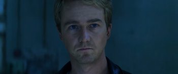 Movie still from “Red Dragon” (2002), directed by Brett Ratner – A person wearing a black shirt; Close Up shot, Over the shoulder angle