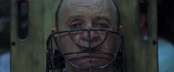 Movie still from “Red Dragon” (2002), directed by Brett Ratner – A person wearing a baseball helmet; Close Up shot, Low angle