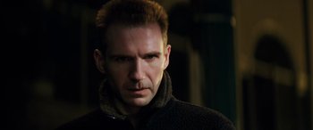 Movie still from “Red Dragon” (2002), directed by Brett Ratner – A person wearing a jacket; Close Up shot, Low angle