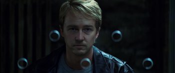 Movie still from “Red Dragon” (2002), directed by Brett Ratner – A person wearing a leather jacket; Close Up shot, Low angle