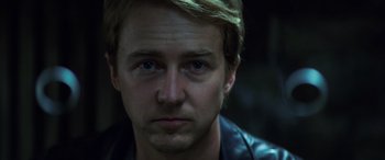 Movie still from “Red Dragon” (2002), directed by Brett Ratner – A person wearing a leather jacket; Close Up shot, Low angle