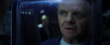 Movie still from “Red Dragon” (2002), directed by Brett Ratner – A person looking at the camera; Close Up shot, Over the shoulder angle