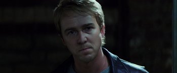 Movie still from “Red Dragon” (2002), directed by Brett Ratner – A person wearing a leather jacket; Close Up shot, Over the shoulder angle