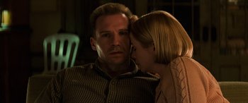 Movie still from “Red Dragon” (2002), directed by Brett Ratner – A man and a woman looking at one another; Close Up shot, Low angle