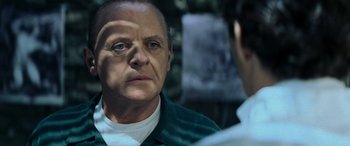 Movie still from “Red Dragon” (2002), directed by Brett Ratner – A man looking at himself in the mirror; Close Up shot, Over the shoulder angle