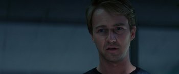 Movie still from “Red Dragon” (2002), directed by Brett Ratner – A person wearing a black t - shirt; Close Up shot, Over the shoulder angle