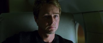 Movie still from “Red Dragon” (2002), directed by Brett Ratner – A person wearing a black shirt; Close Up shot, Low angle