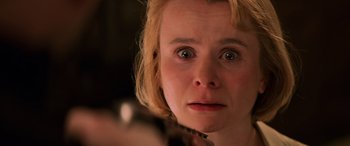 Movie still from “Red Dragon” (2002), directed by Brett Ratner – A person holding a gun; Extreme Close Up shot, Low angle