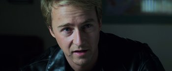 Movie still from “Red Dragon” (2002), directed by Brett Ratner – A man's face in a dark room; Close Up shot, Low angle