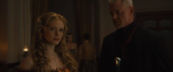 Movie still from “Redeeming Love” (2022), directed by D.J. Caruso – A man and a woman standing next to each other in a room; Close Up shot, Over the shoulder angle