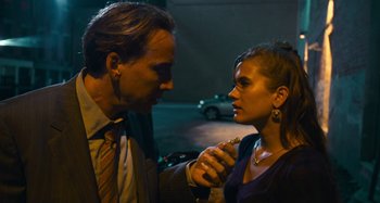 Movie still from “Bad Lieutenant: Port of Call New Orleans” (2009), directed by Werner Herzog – A man and a woman are looking at each other; Close Up shot, Over the shoulder angle