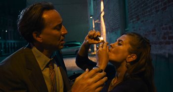 Movie still from “Bad Lieutenant: Port of Call New Orleans” (2009), directed by Werner Herzog – A man and a woman are putting makeup on; Close Up shot, Low angle