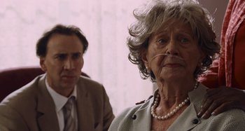 Movie still from “Bad Lieutenant: Port of Call New Orleans” (2009), directed by Werner Herzog – A man and a woman are looking at each other; Close Up shot, Over the shoulder angle