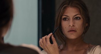 Movie still from “Bad Lieutenant: Port of Call New Orleans” (2009), directed by Werner Herzog – A beautiful woman holding a cell phone up to her ear; Close Up shot, Over the shoulder angle