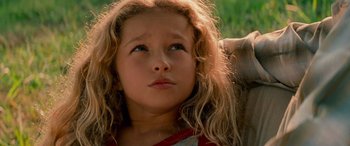 Movie still from “Remember the Titans” (2000), directed by Boaz Yakin – A child looking up at the sky; Close Up shot, High angle