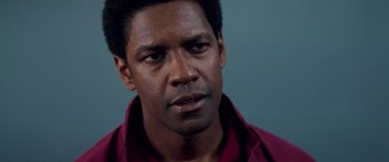 Movie still from “Remember the Titans” (2000), directed by Boaz Yakin – A person wearing a red shirt; Close Up shot, Over the shoulder angle