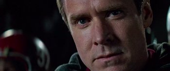 Movie still from “Remember the Titans” (2000), directed by Boaz Yakin – A man's eyes and face; Close Up shot, Over the shoulder angle